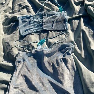 Baby blue two piece set bandeau top with one shoulder and mini skirt